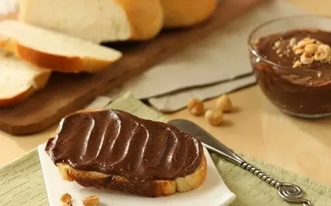 تصویر 1 از خرید ارده کنجد شکلاتی + قیمت فروش استثنایی